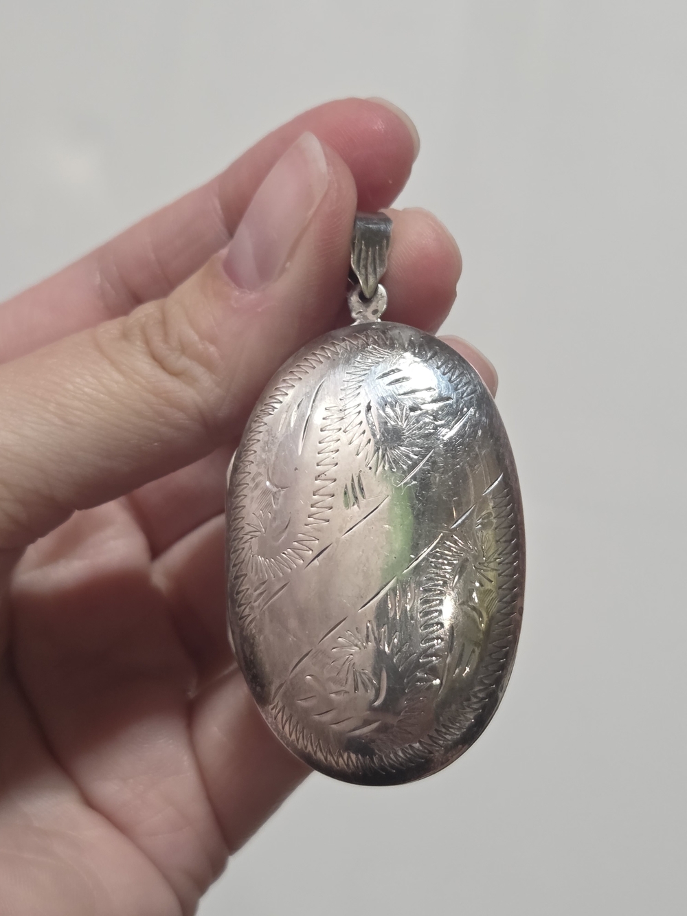 Engraved Oval Locket Necklace in Sterling Silver